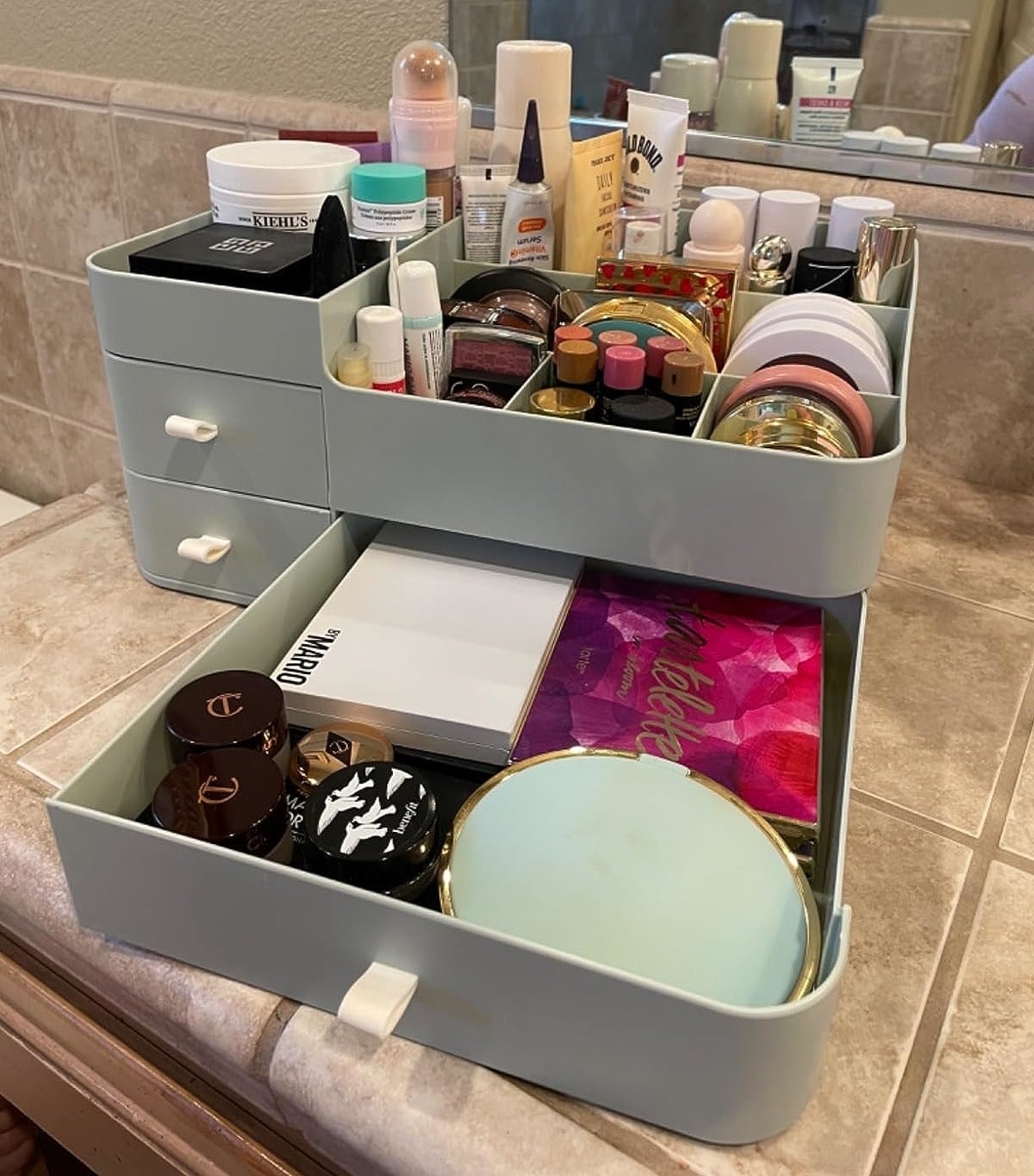 Reviewer image of the organizer filled with makeup on their vanity