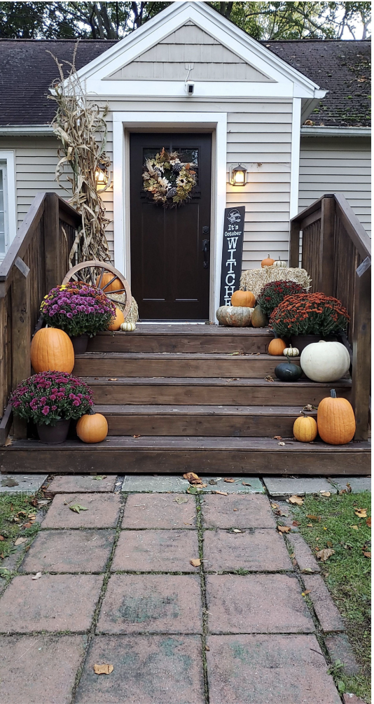 a decorated front porch of a house