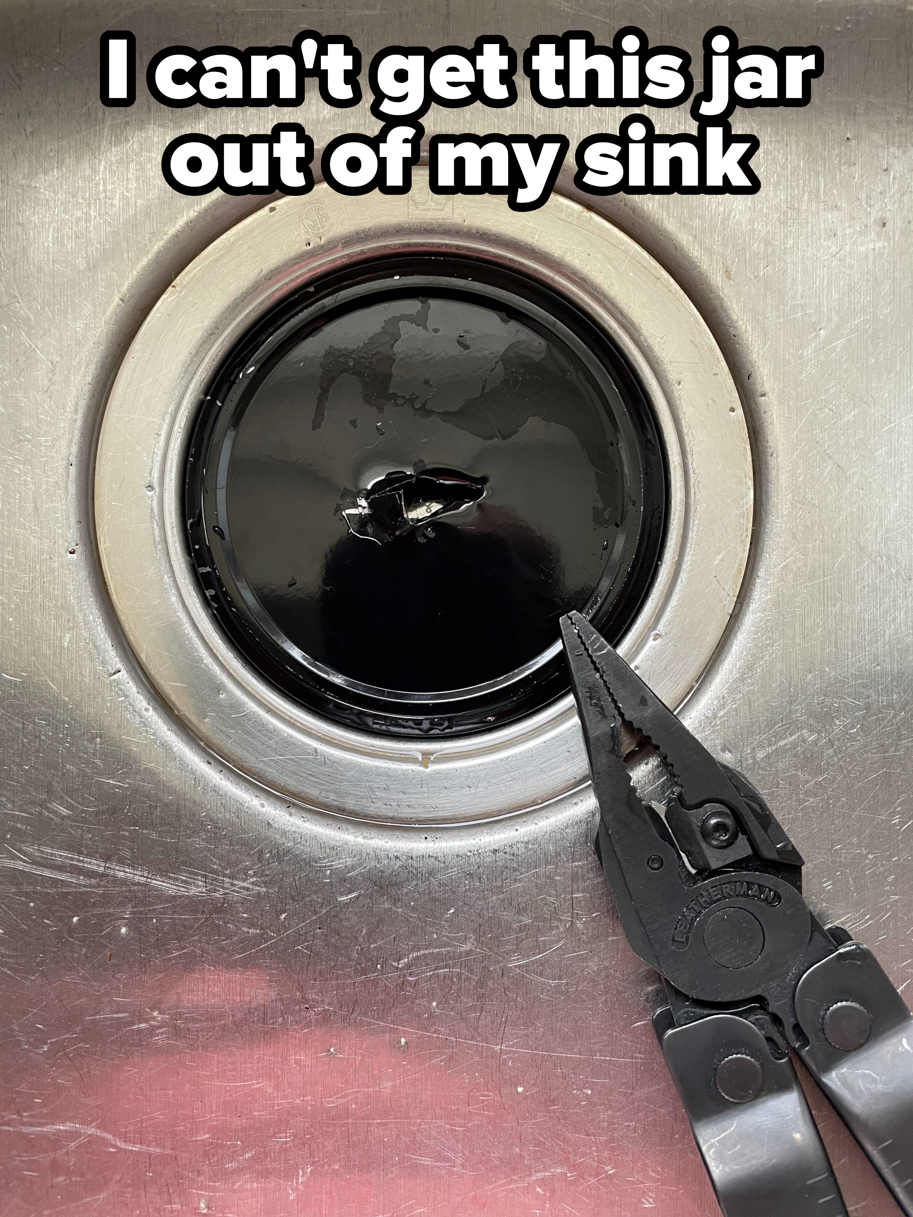 A jar stuck in a sink with a pair of pliers next to it, with caption, &quot;I can&#x27;t get this jar out of my sink&quot;