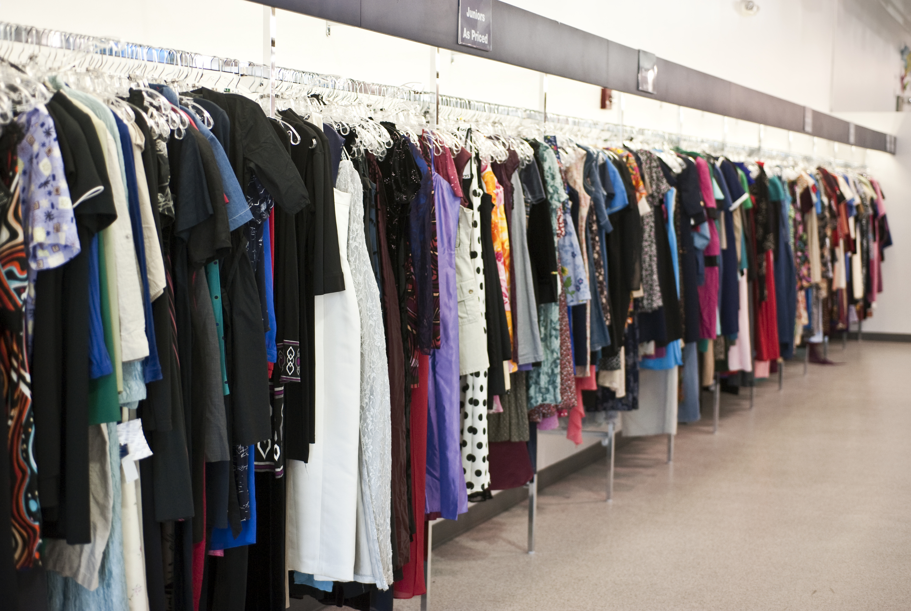 thrift store rack of clothes