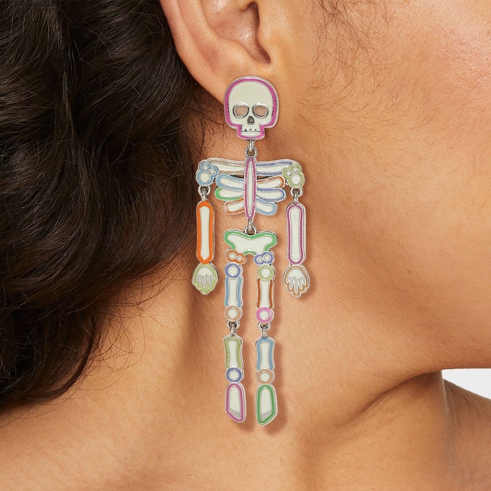the skeleton earring with each body part outlined in a different color