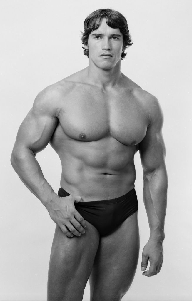 arnold when he was younger in a speedo to show off his muscles