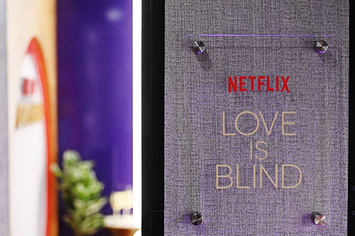 A placard for Love Is Blind at a Netflix publicity event