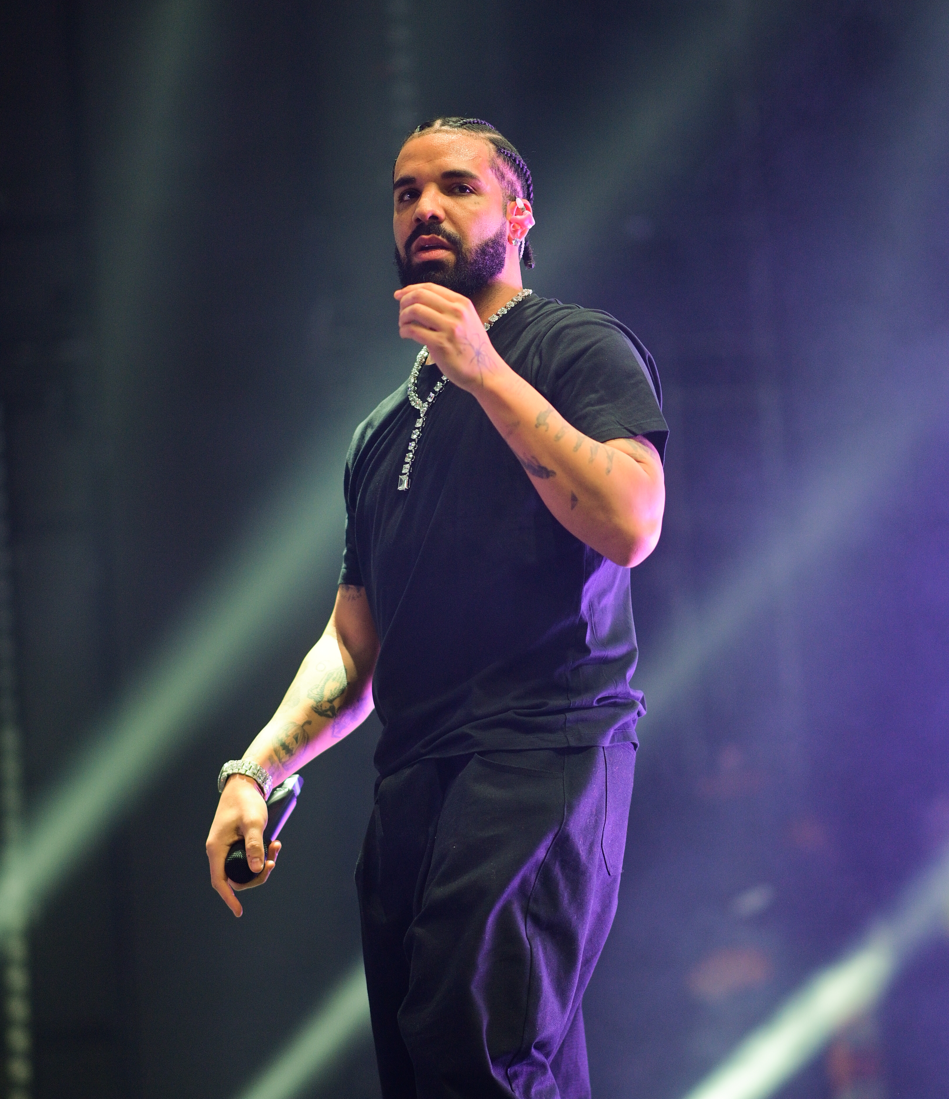 Drake onstage performing