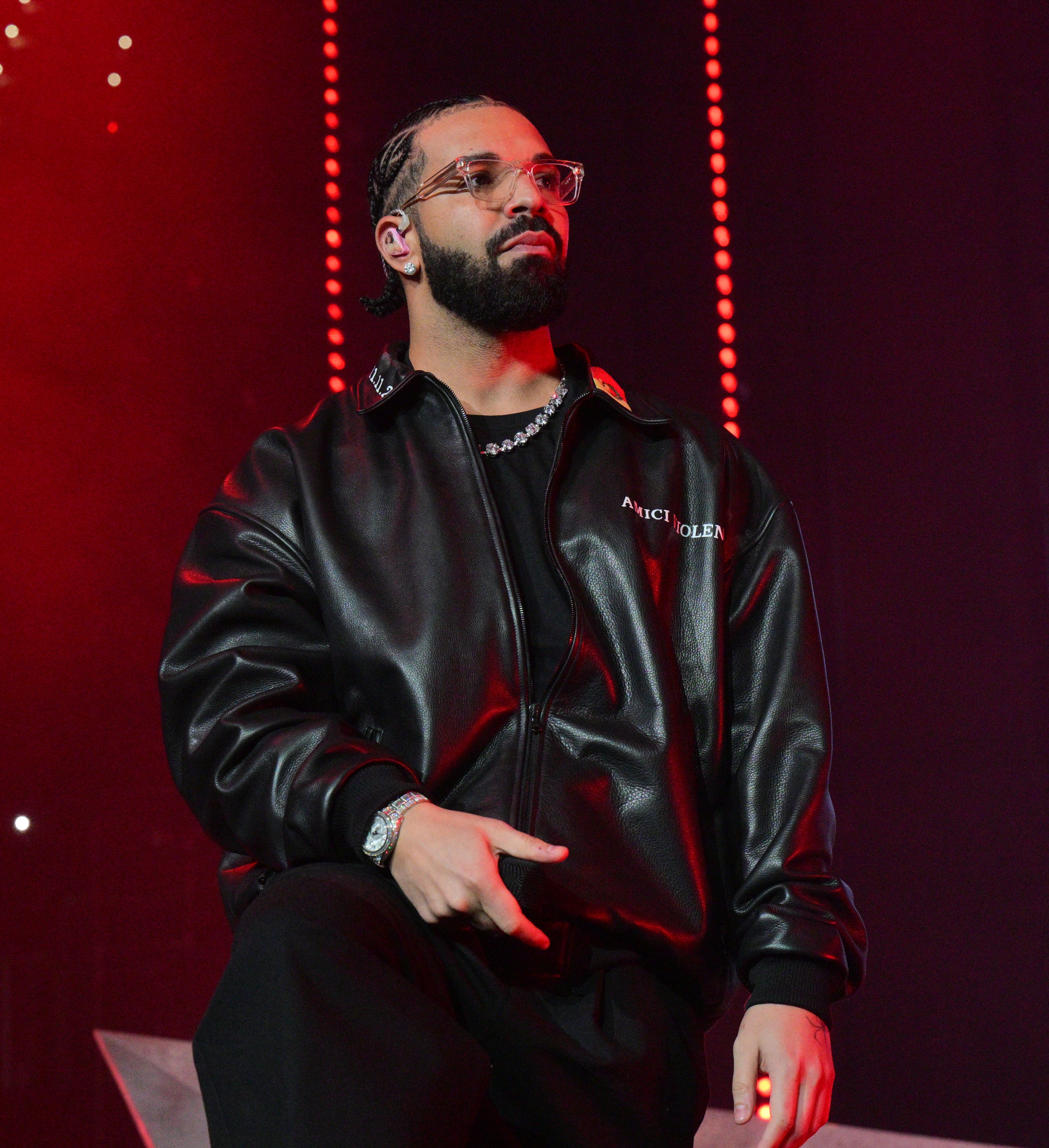 Close-up of Drake in a leather jacket