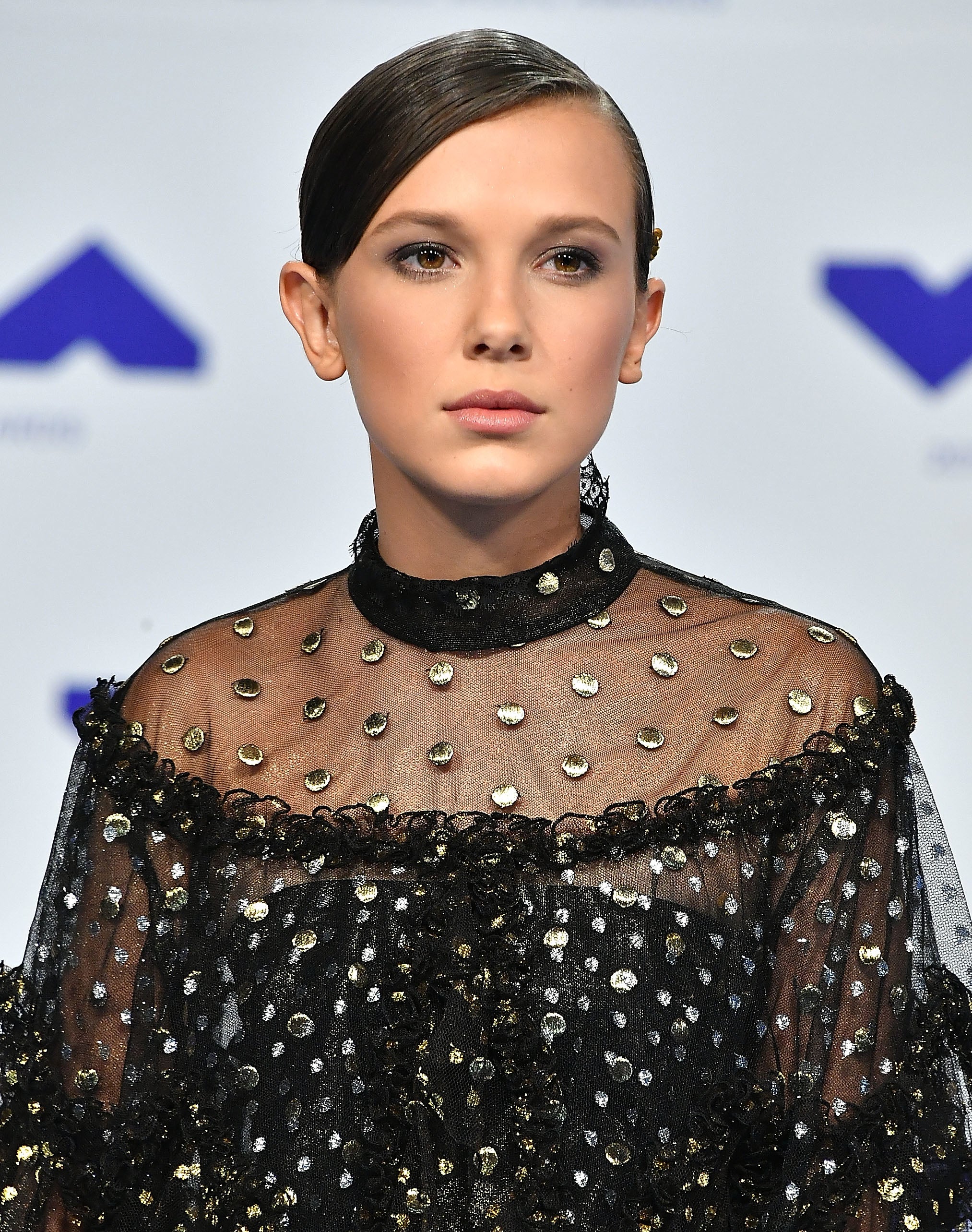 Close-up of Millie at a media event