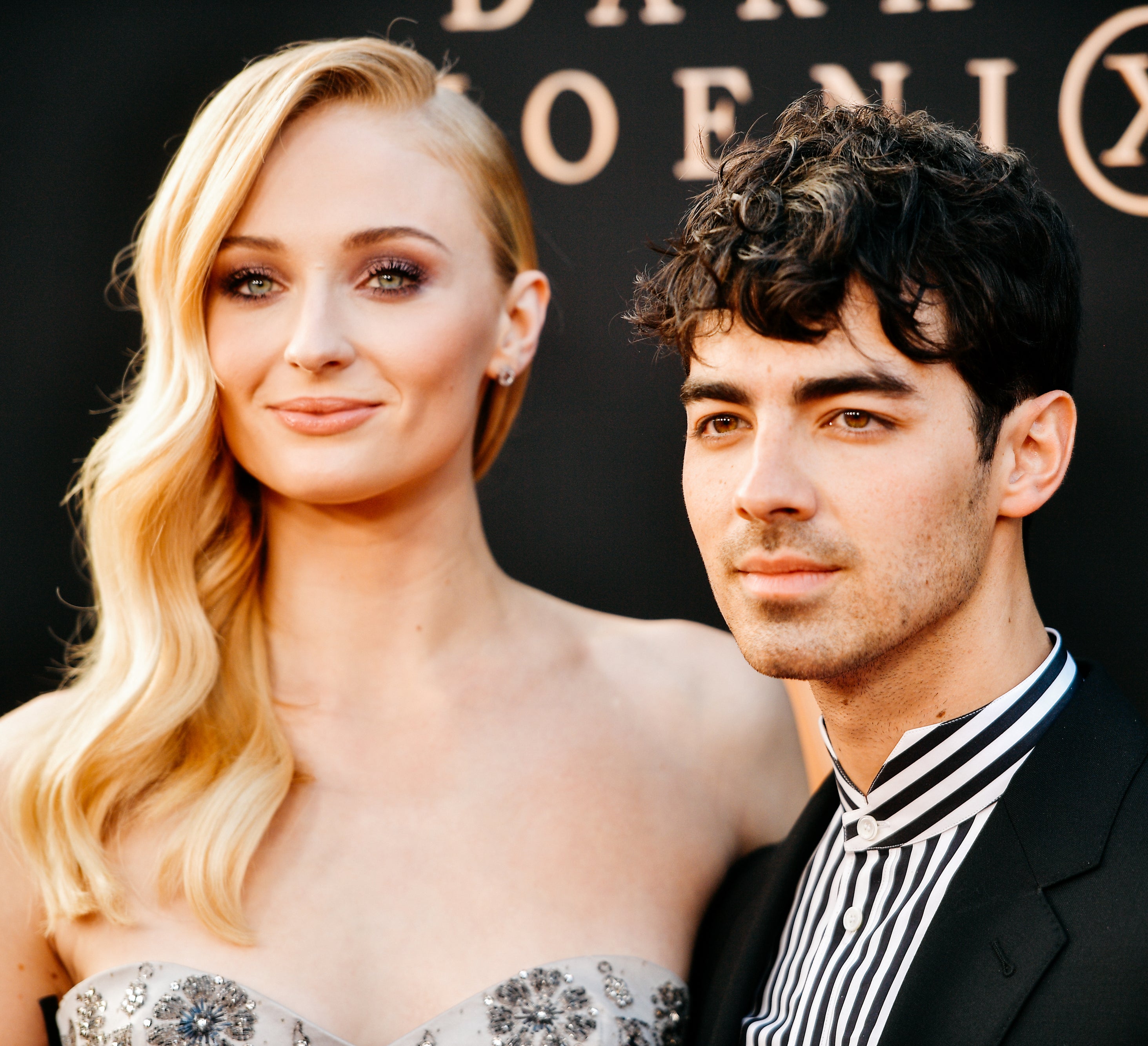 Close-up of Sophie and Joe at a media event