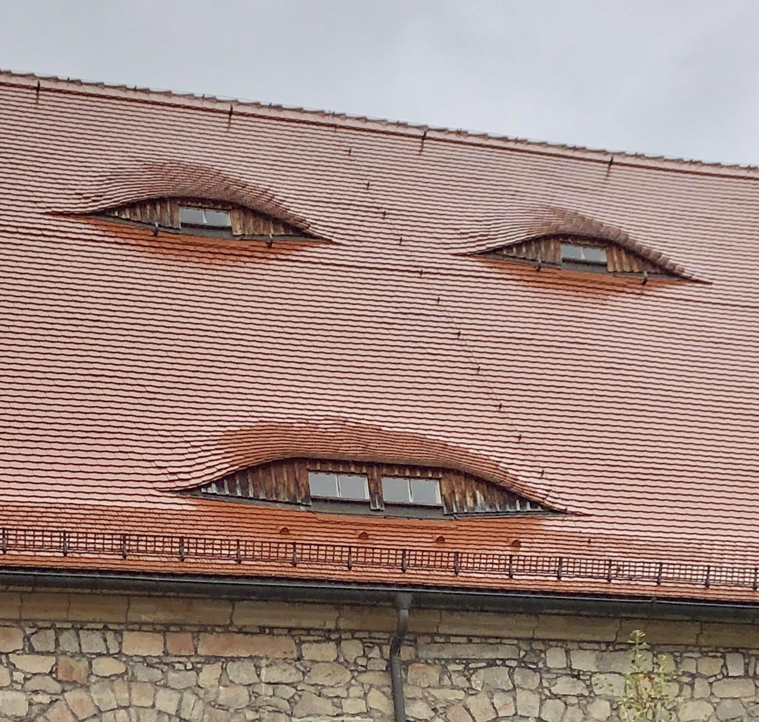 A face on a roof