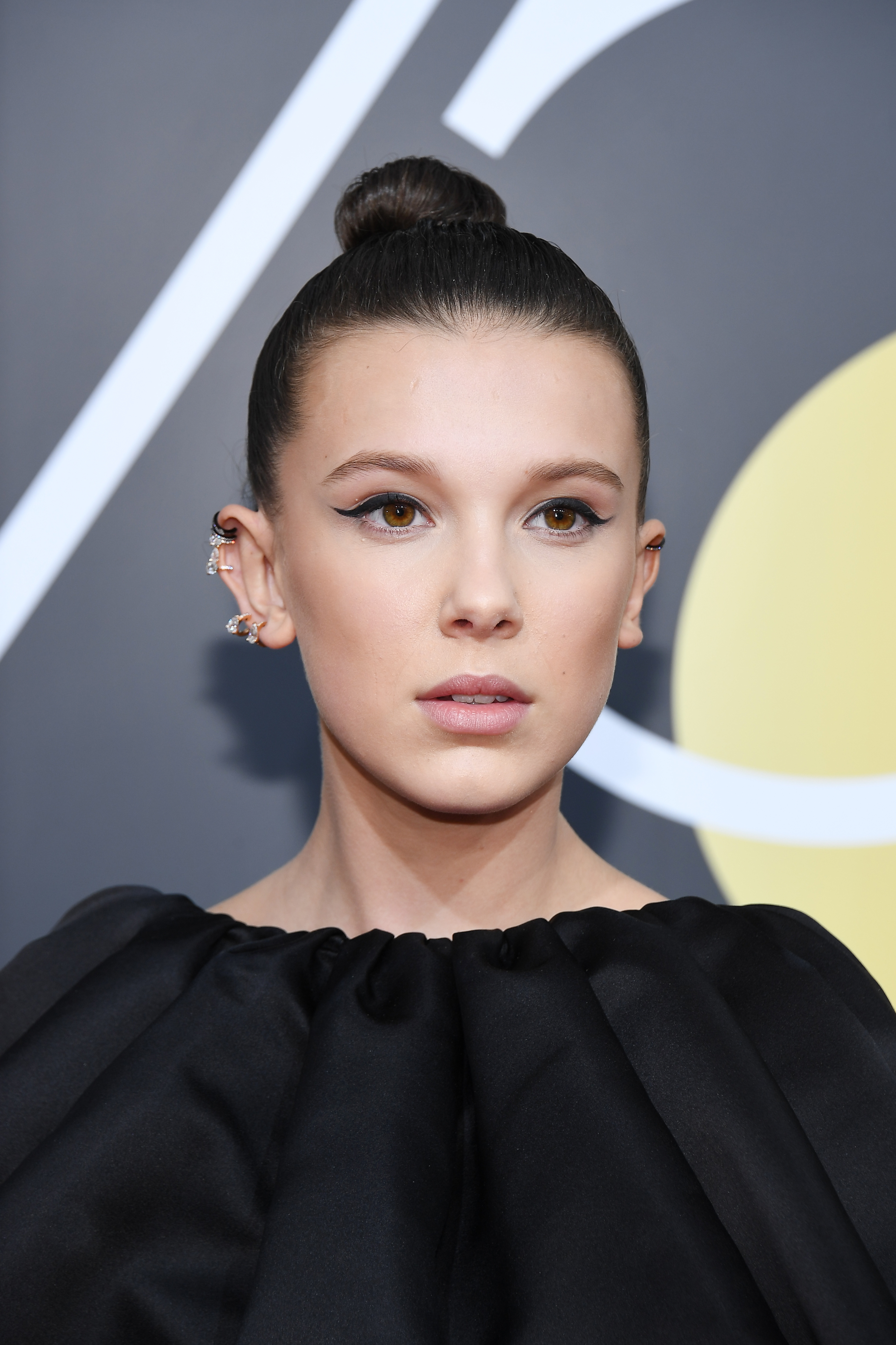 Close-up of Millie at a media event