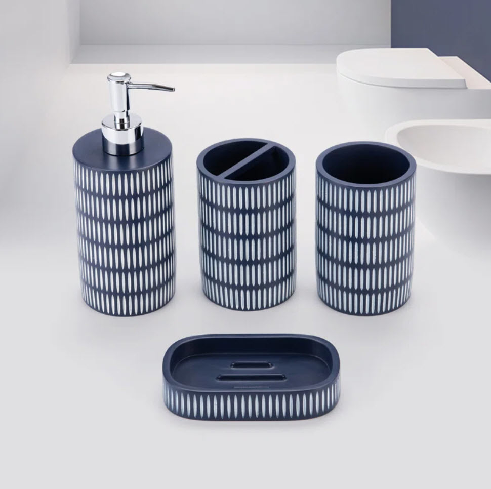 dark blue and white patterned soap and dish set