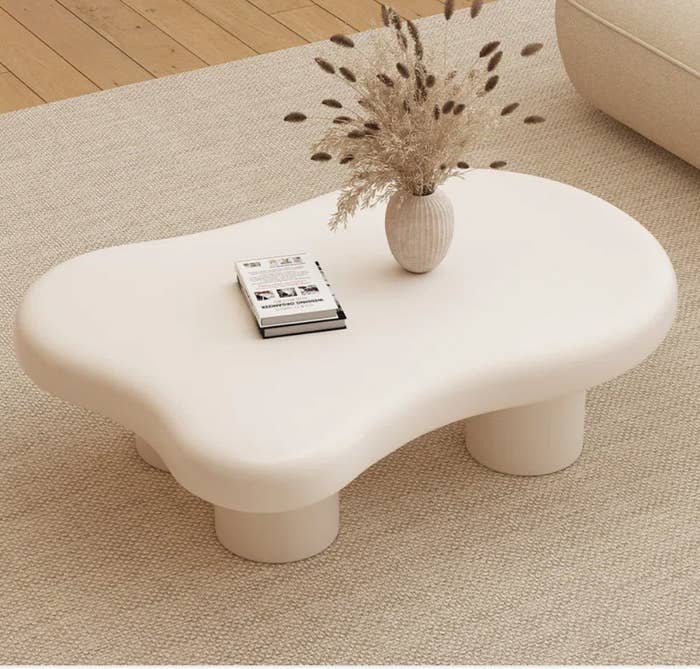 curvy shaped low white coffee table