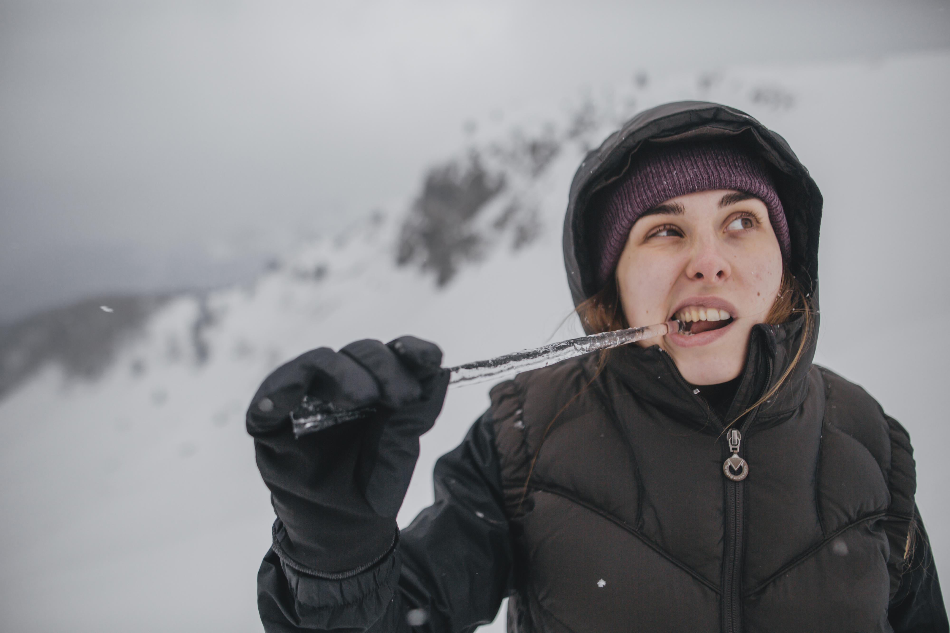 a person hitting an icicle