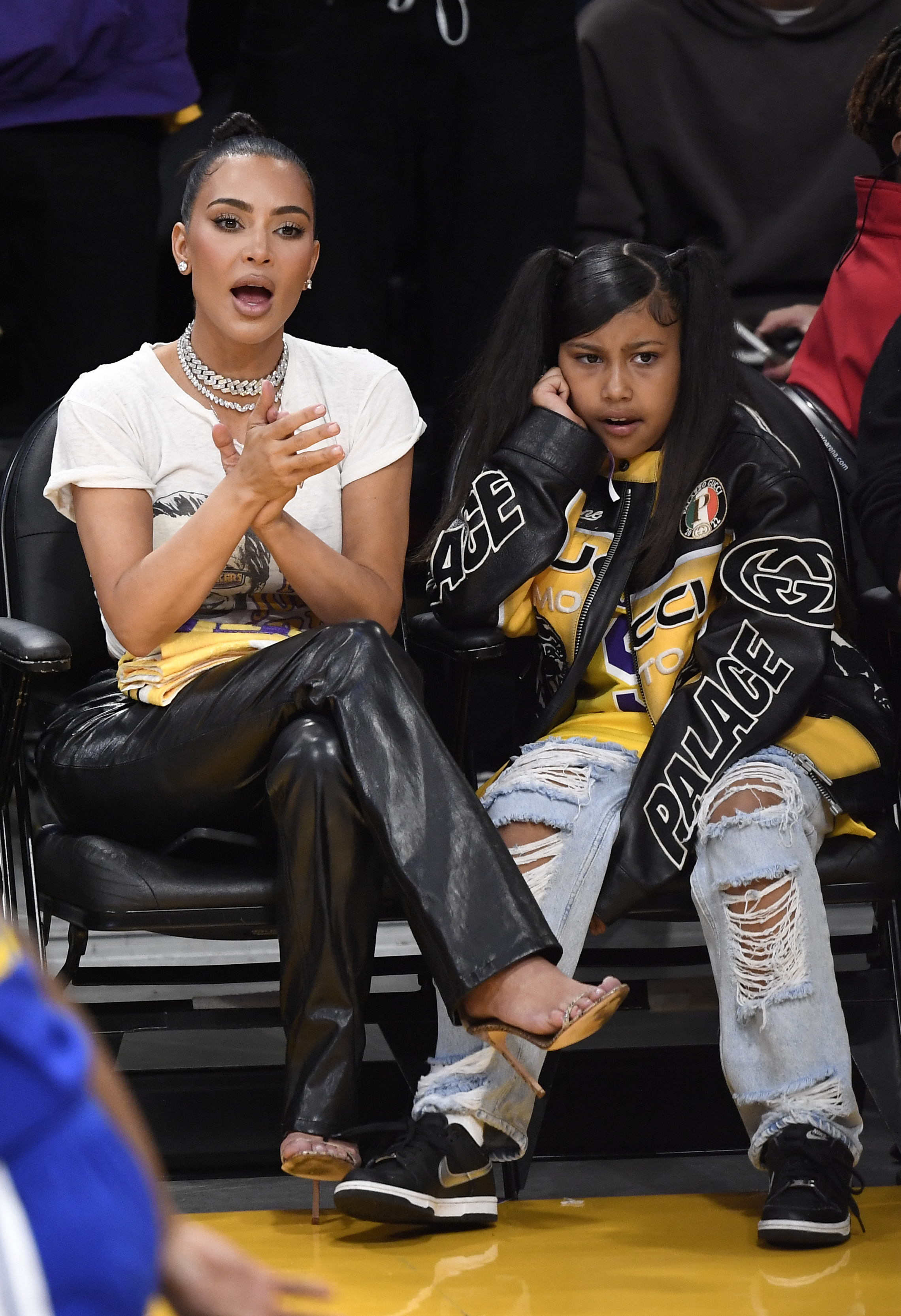 Kim Kardashian and North West at a basketball game