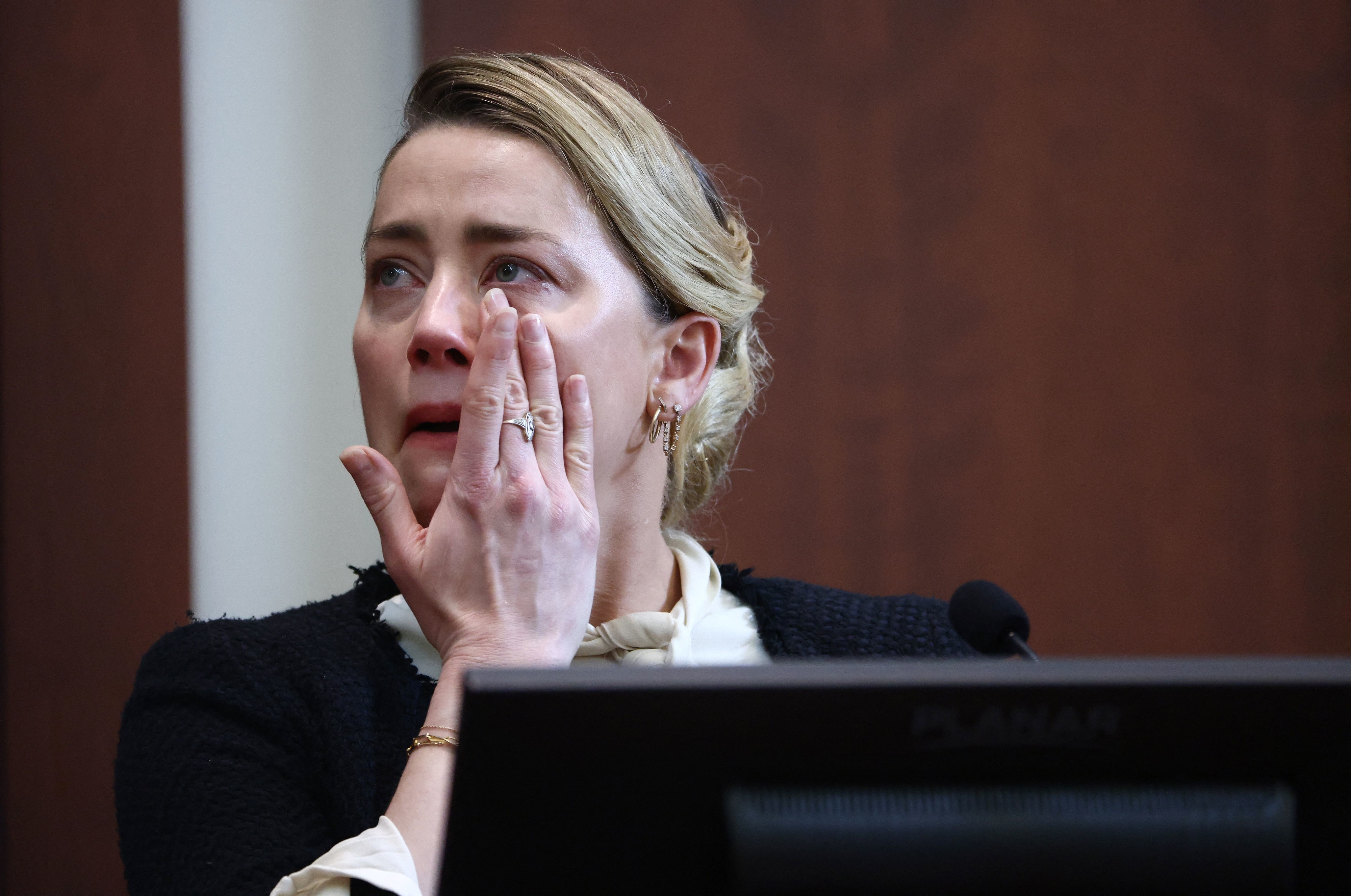 Amber in tears in court