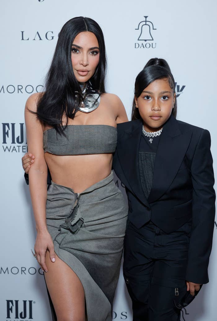 Kim Kardashian and North West pose for photographers on the red carpet