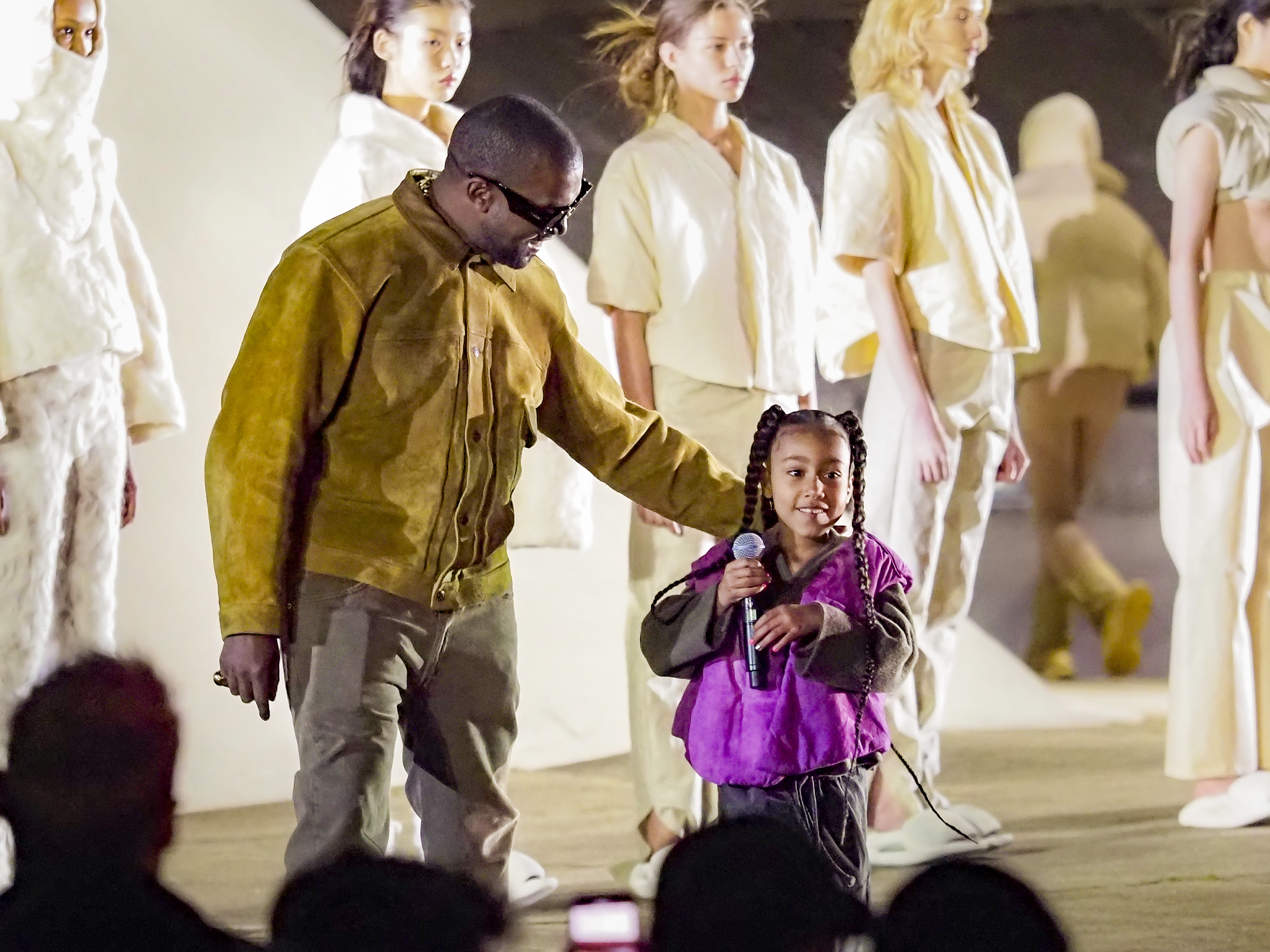 Kanye and North West performing