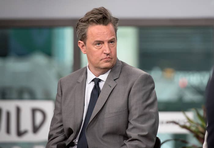 Closeup of Matthew Perry in a suit and tie