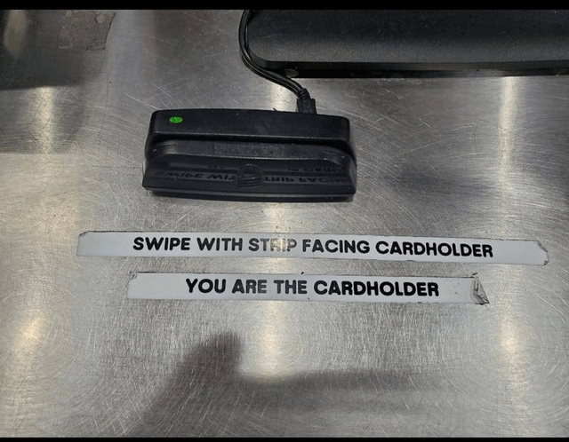 swipe with strip facing cardholder, you are the cardholder