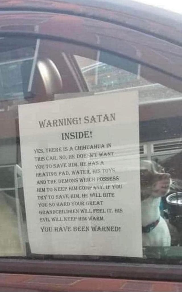 car window note saying that there is a chihuahua inside who has heating, water, toys, and does not need to be saved