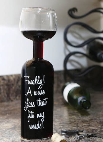 The BigMouth Inc. Original Wine Bottle Glass that says, 