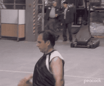 gif of Michael Scott dribbling a basketball