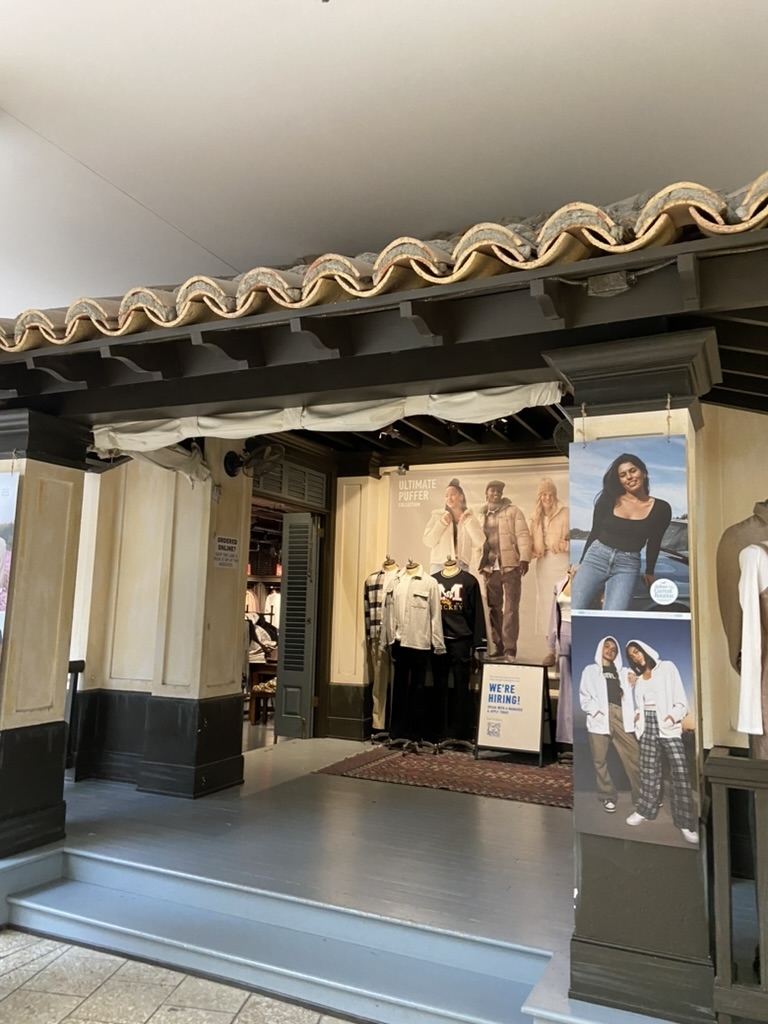 The entrance to a Hollister store that resembles a California beach house