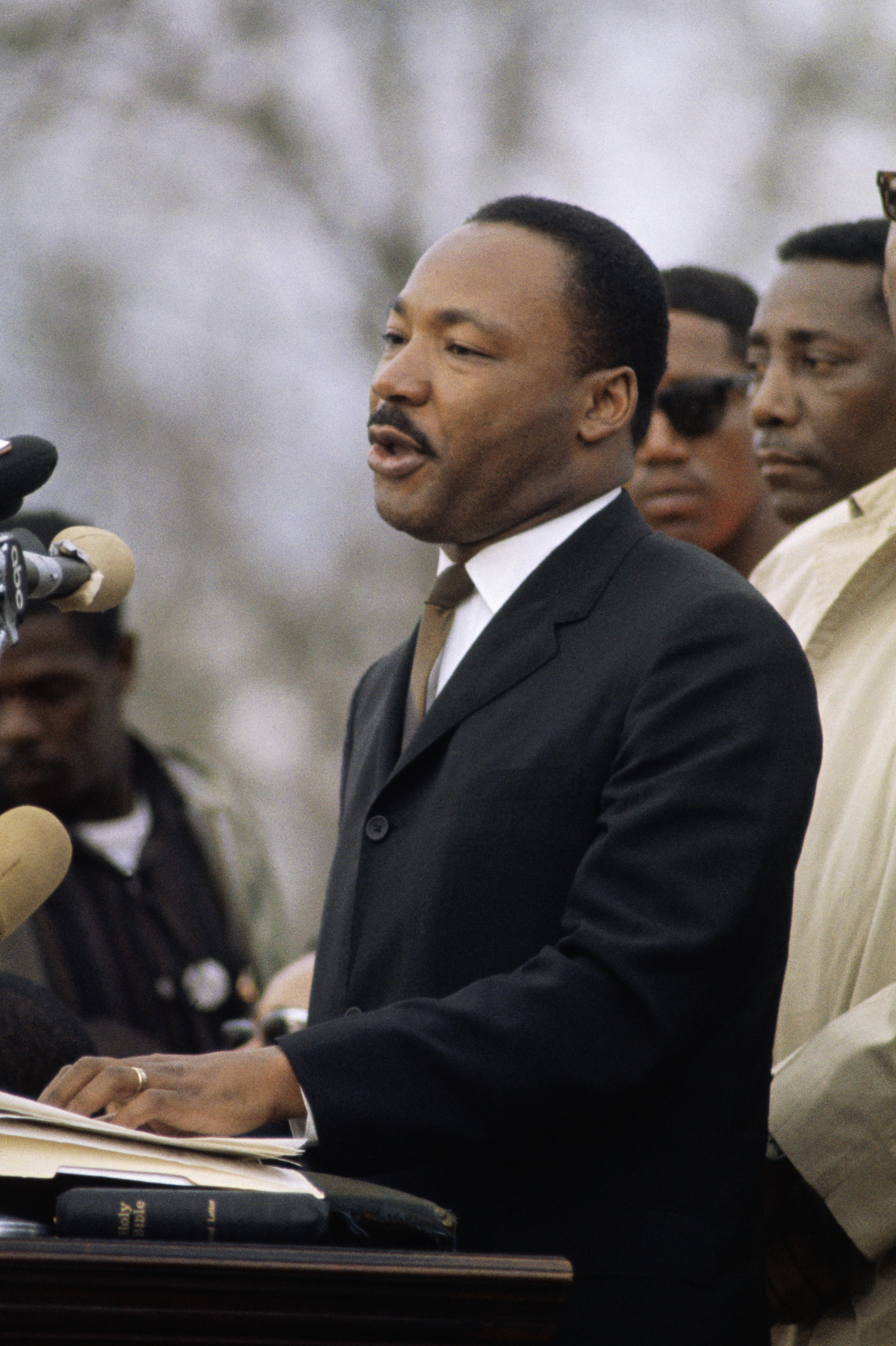 Closeup of Martin Luther King Jr. at a podium speaking