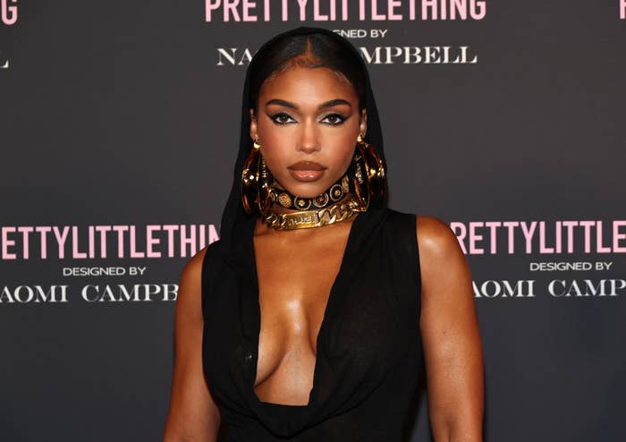 Lori Harvey poses for photographers on the red carpet
