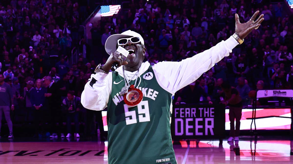 The Public Enemy rapper says he dedicated his national anthem performance to his family members in the military and responded to 50 Cent's dig with some subtle shade.