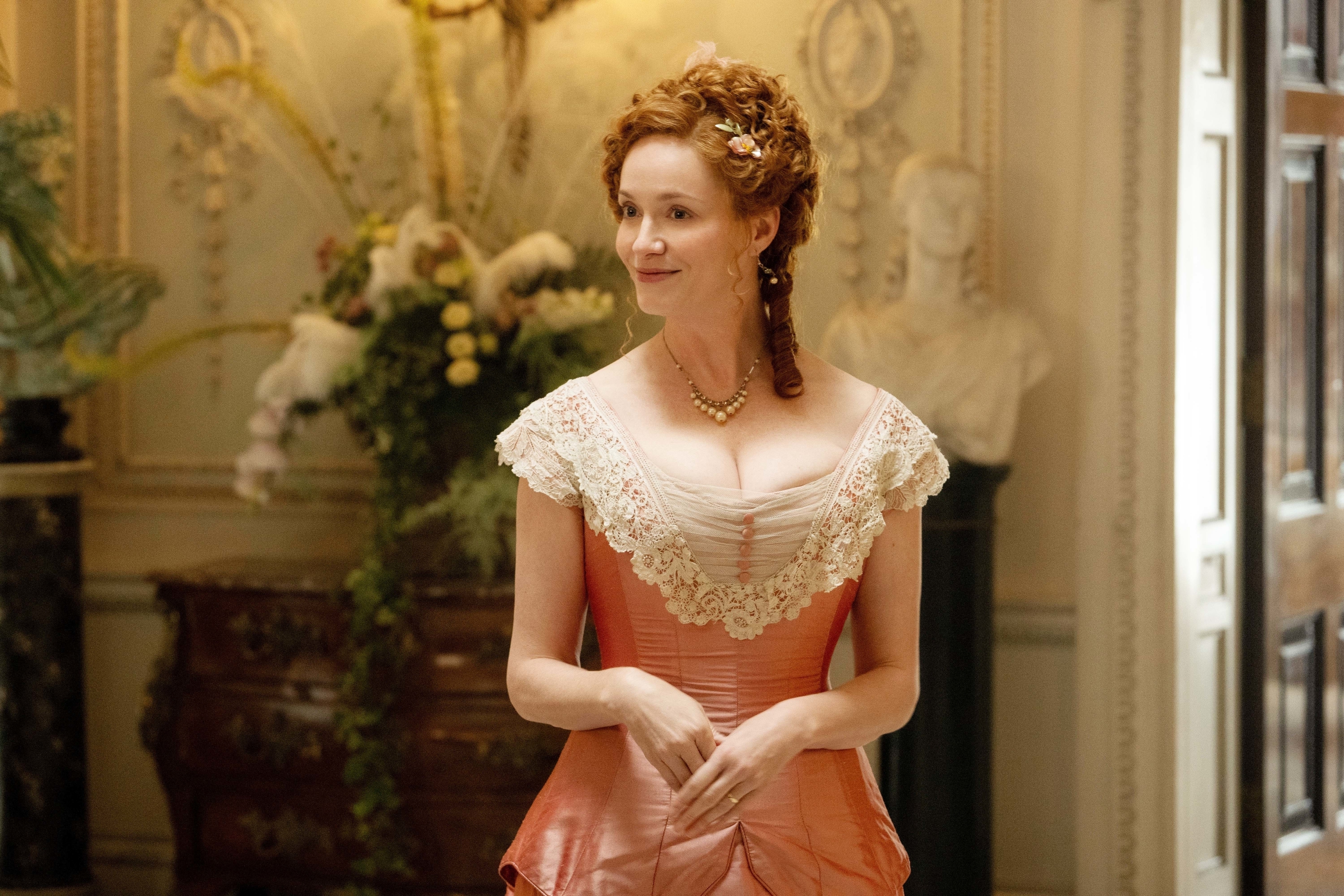 closeup of a woman standing in regency dress