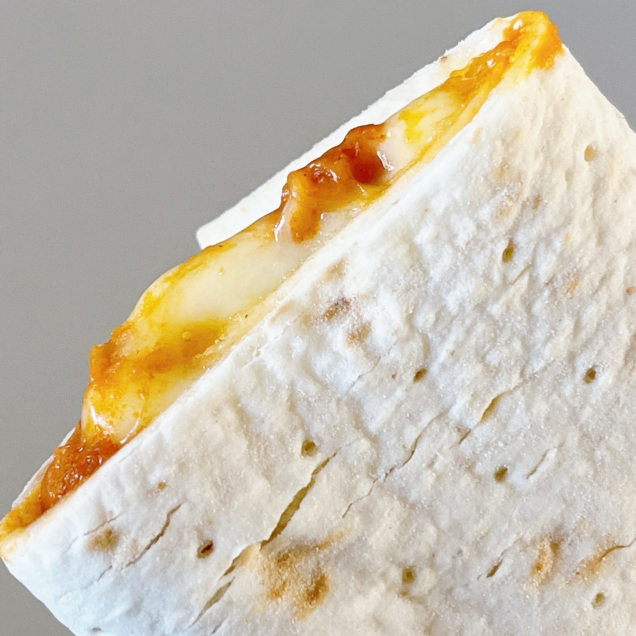 セブン-イレブンのオススメの新商品「ブリトー濃厚トマトクリームのラザニアソース」