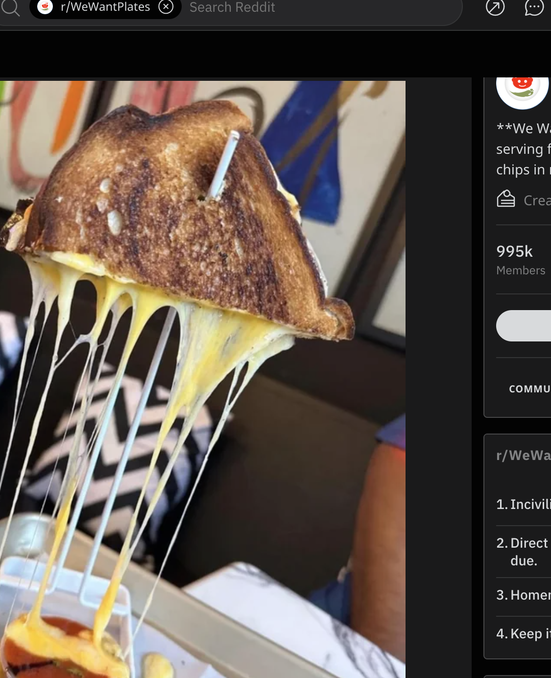 A grilled cheese is impaled