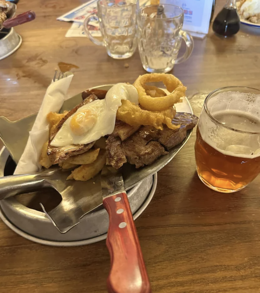 A meal is served on a shovel