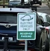 "Electric vehicles only. Reserved parking."