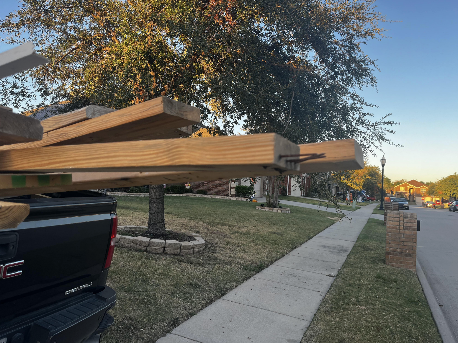 boards hanging off the back of a truck