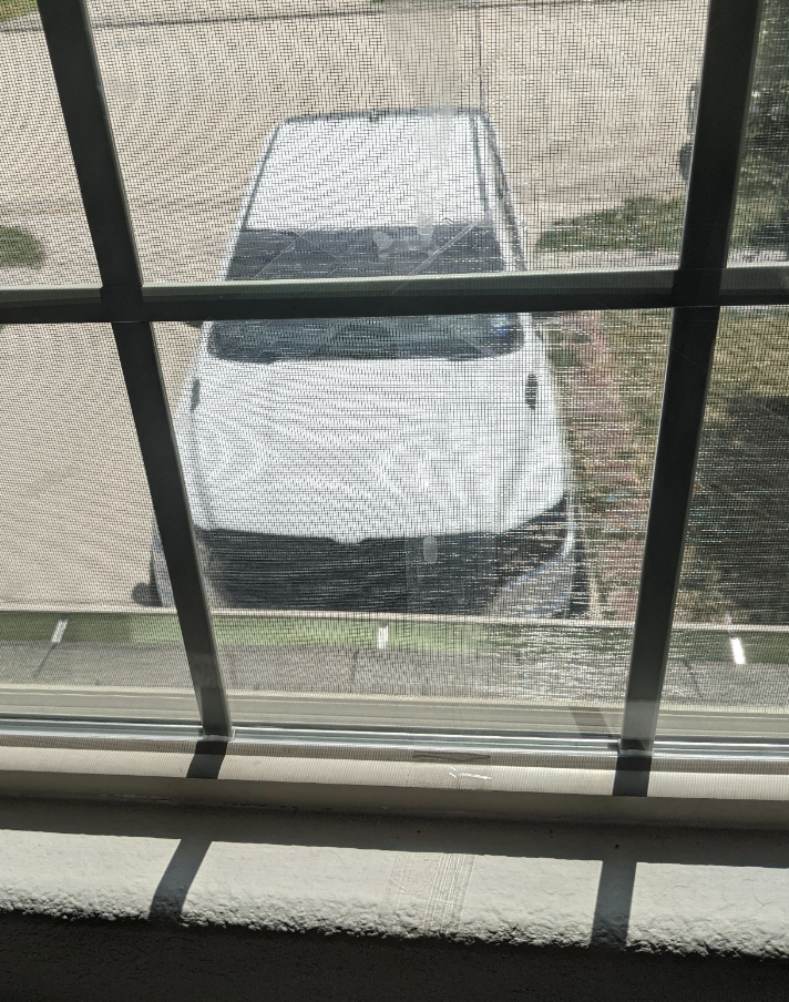 A white truck in the driveway
