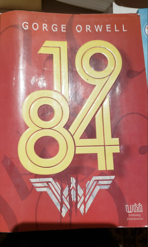 cover of goerge orwells 1984 with a wonder woman logo on it
