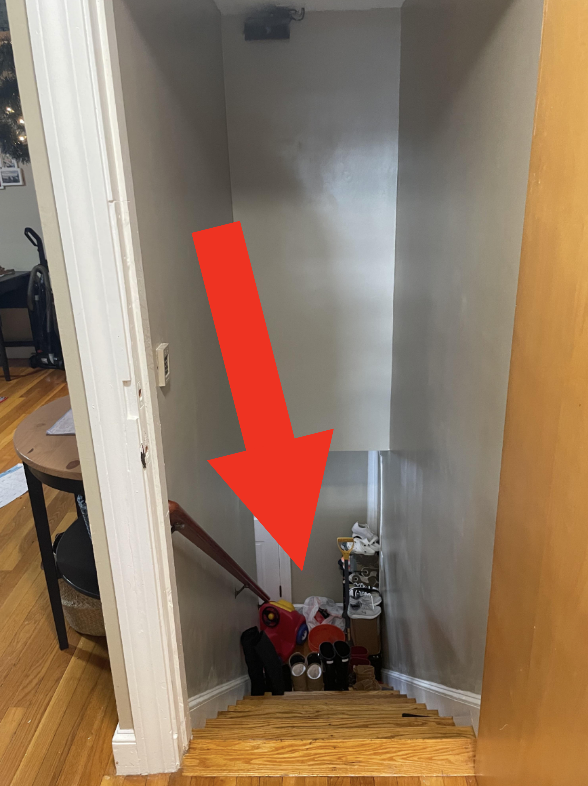 Trash at the bottom of the stairs