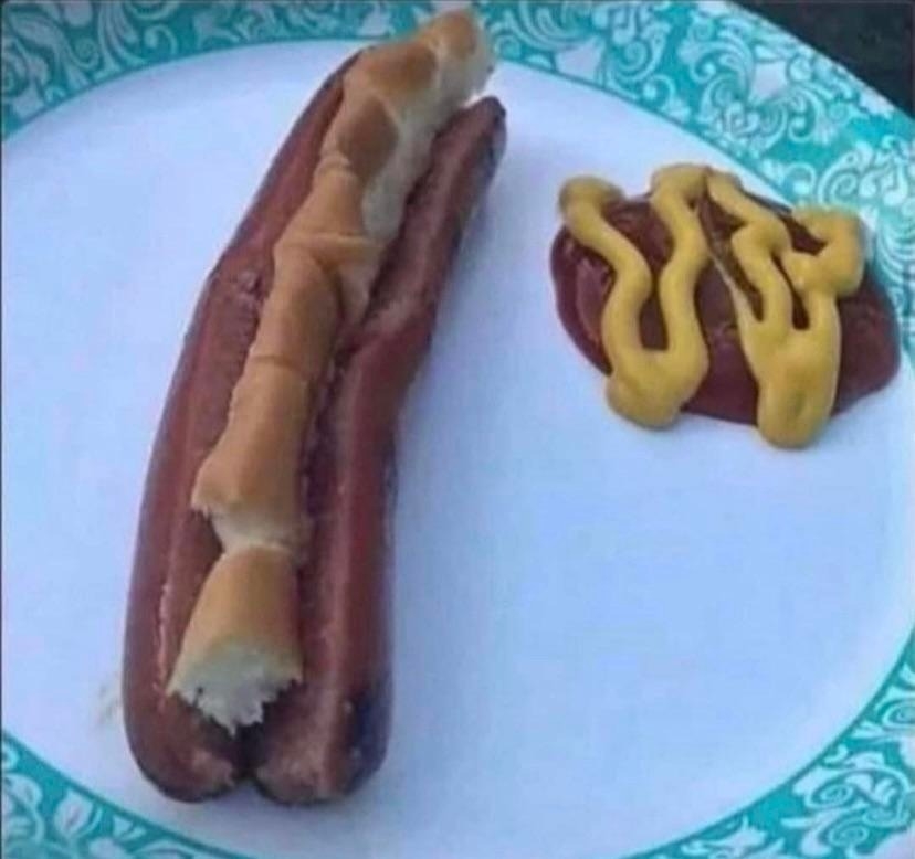 hot dog split in the middle with bread inside