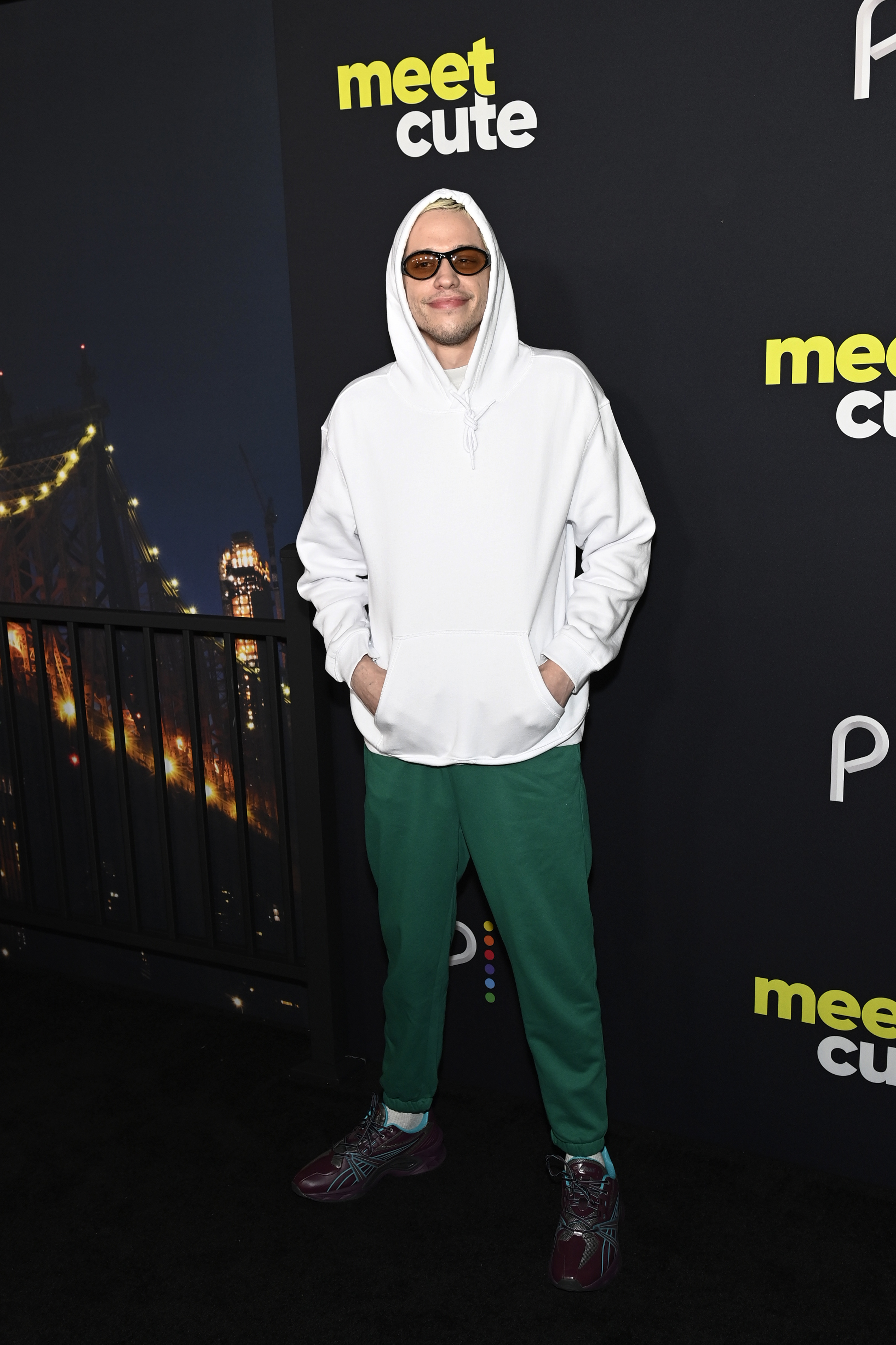 Pete in the casual outfit and wearing glasses