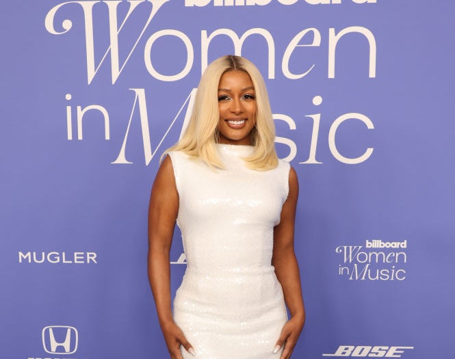 Close-up of Victoria smiling at a media event