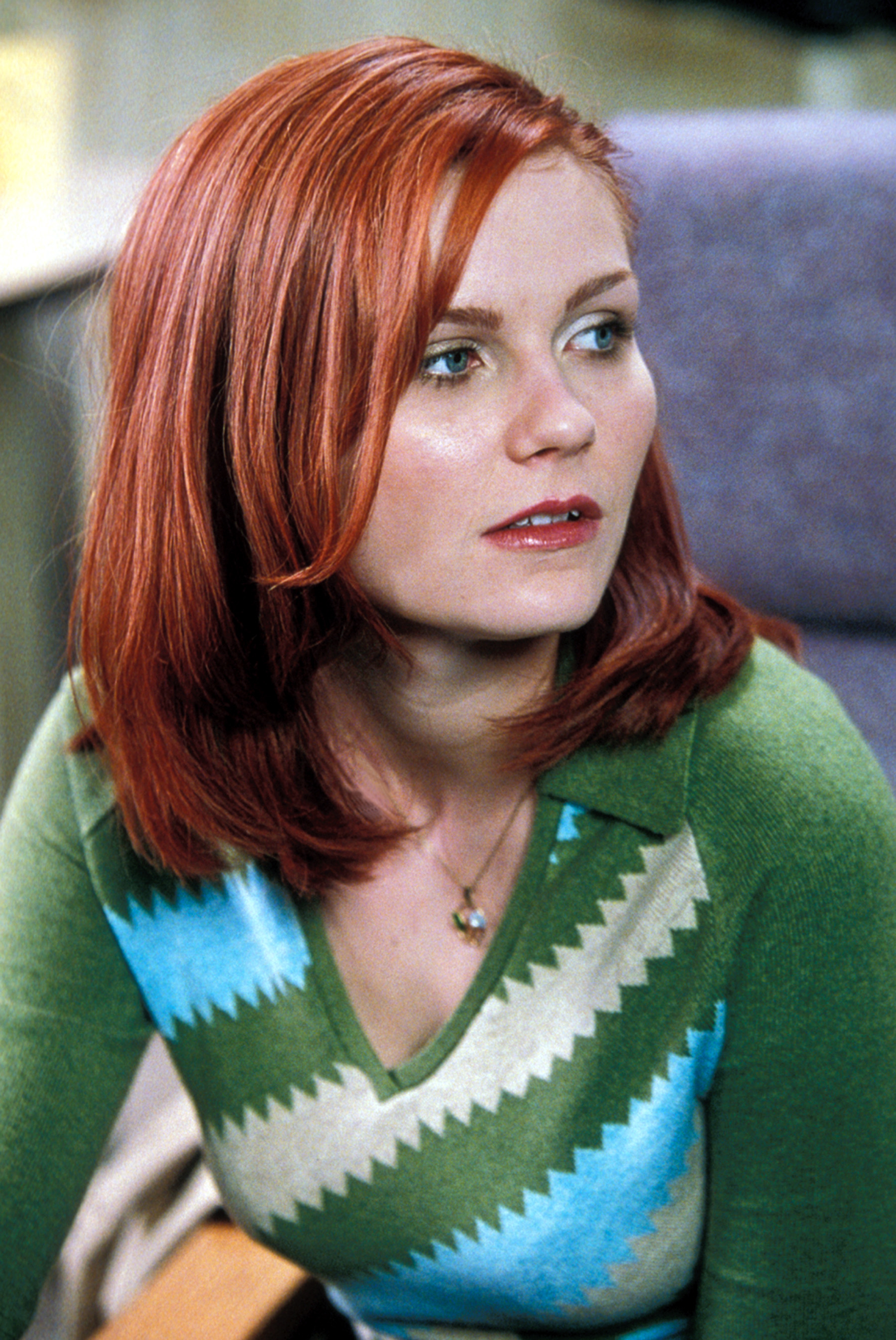 Close-up of Kirsten in a long-sleeved sweater