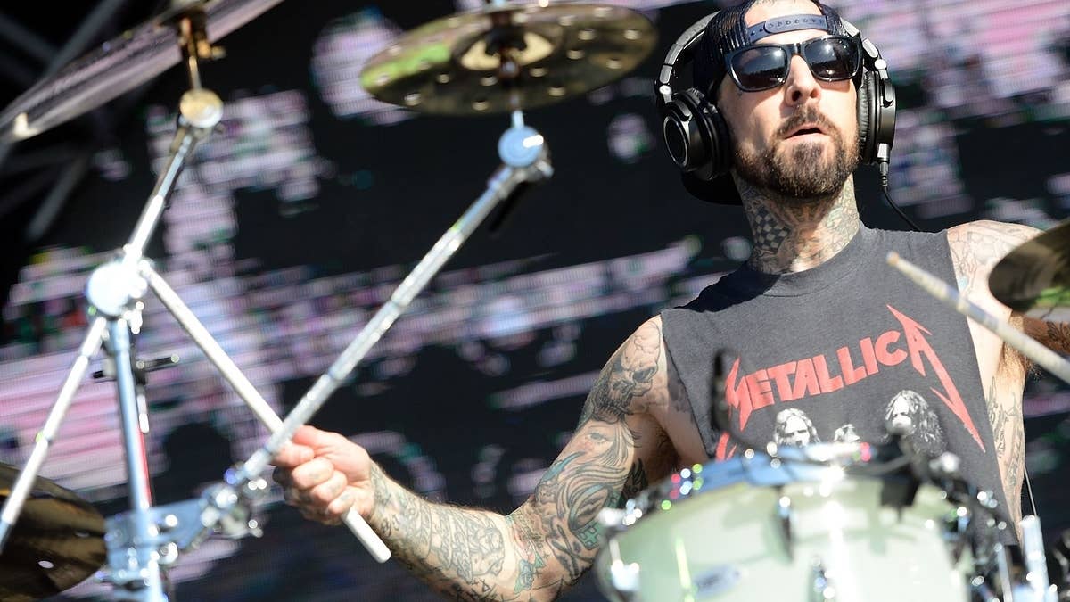 The Blink-182 drummer serenaded Kourtney Kardashian in the delivering room while welcoming the couple's first baby together.