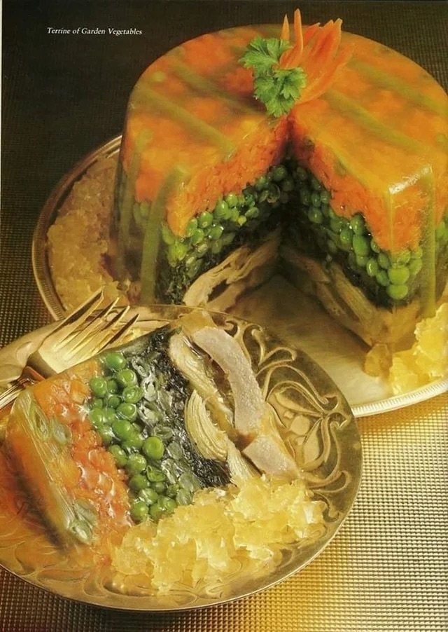 a recipe card for a tower of different layered gelatinized vegetables