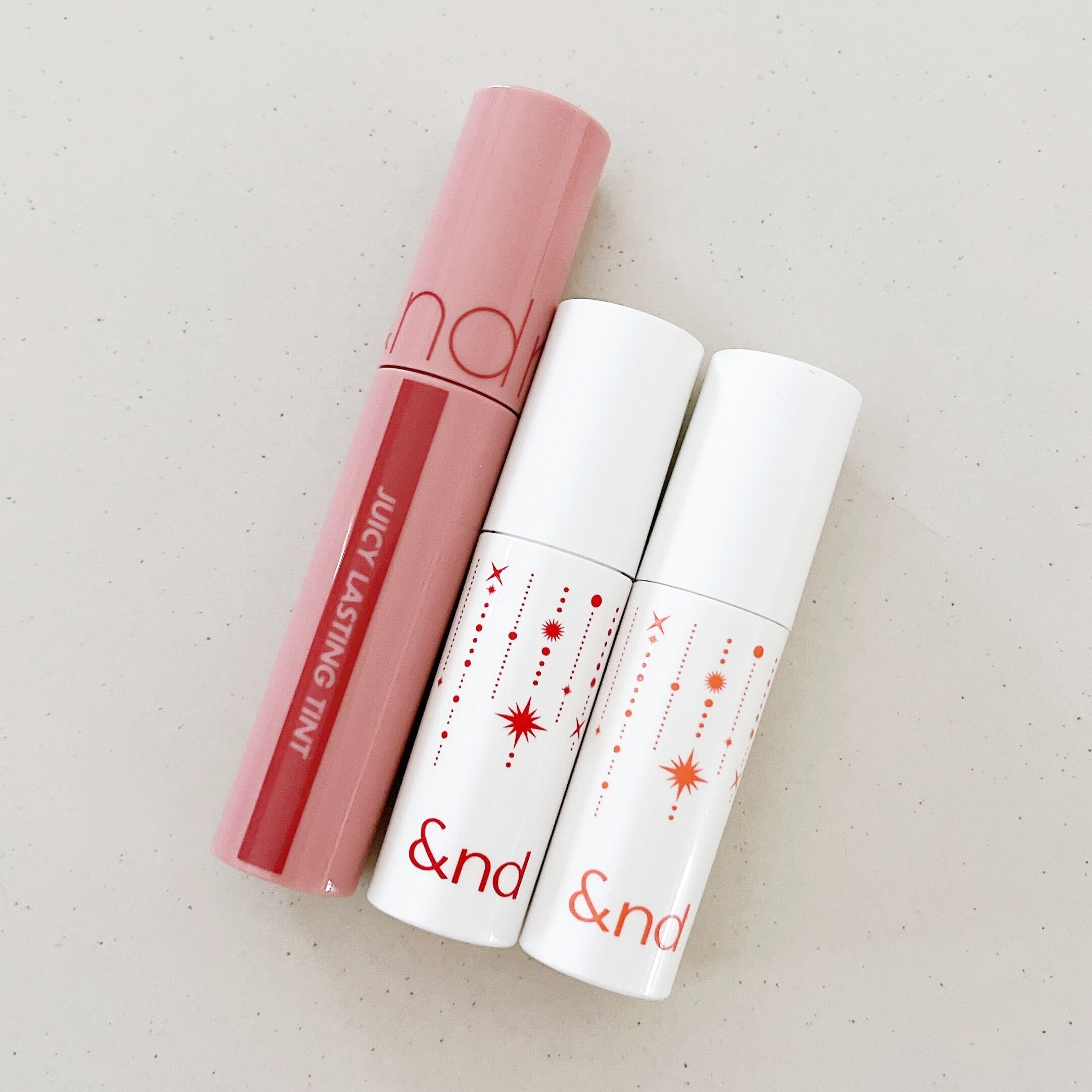 LAWSON(ローソン)のオススメのコスメ「&nd by rom&nd グラッシーボムティントレッドフレーク」「&nd by rom&nd グラッシーボムティントコーラルスノー」