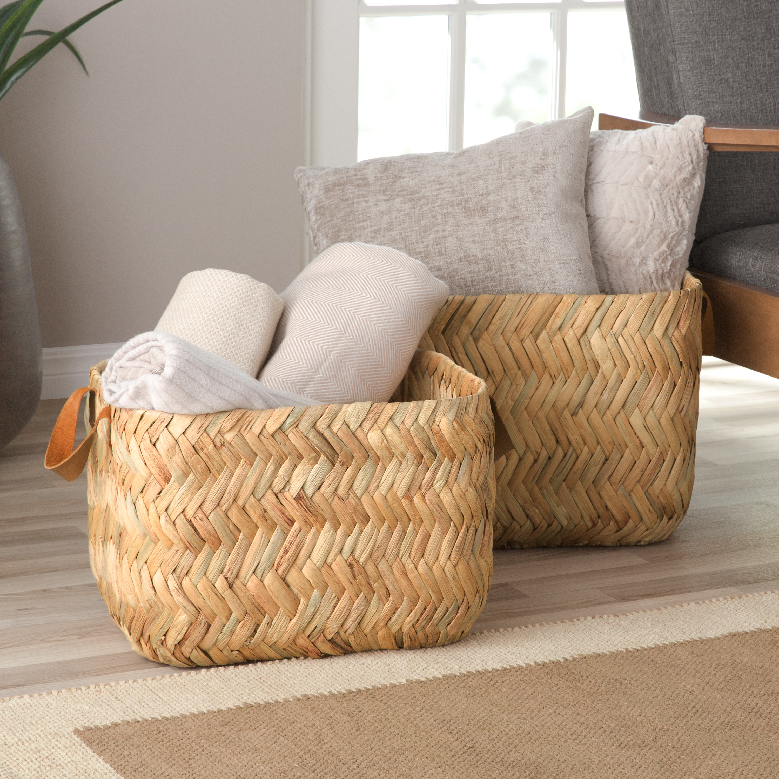 Two woven storage baskets