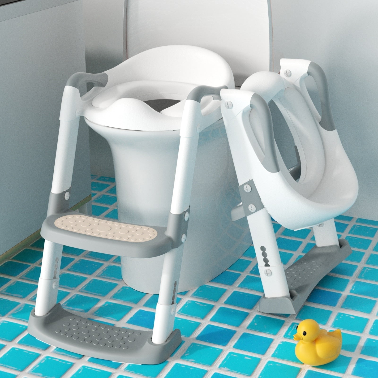 A potty seat on a toilet and folded up next to it