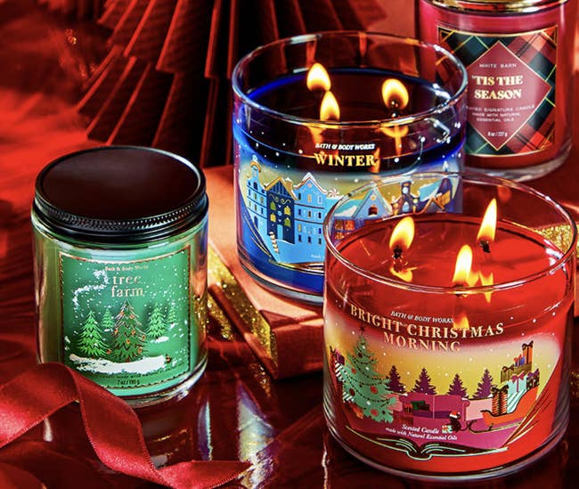 an array of holiday candles from bath and body works