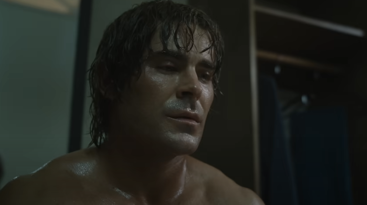 Close-up of Zac sweating in a scene from the Iron Claw