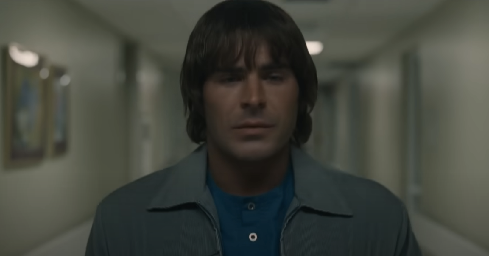 Close-up of Zac in a hallway in a scene from the movie